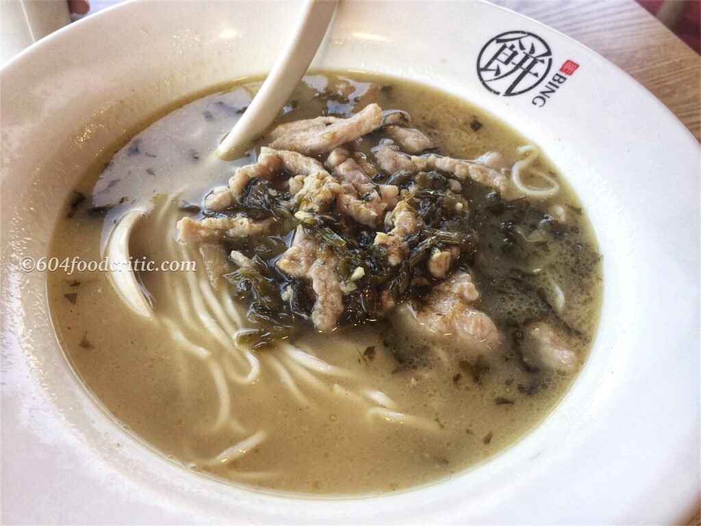 Bing and Noodle World Shredded pork, preserved vegetables, and sliced bamboo thin noodle soup