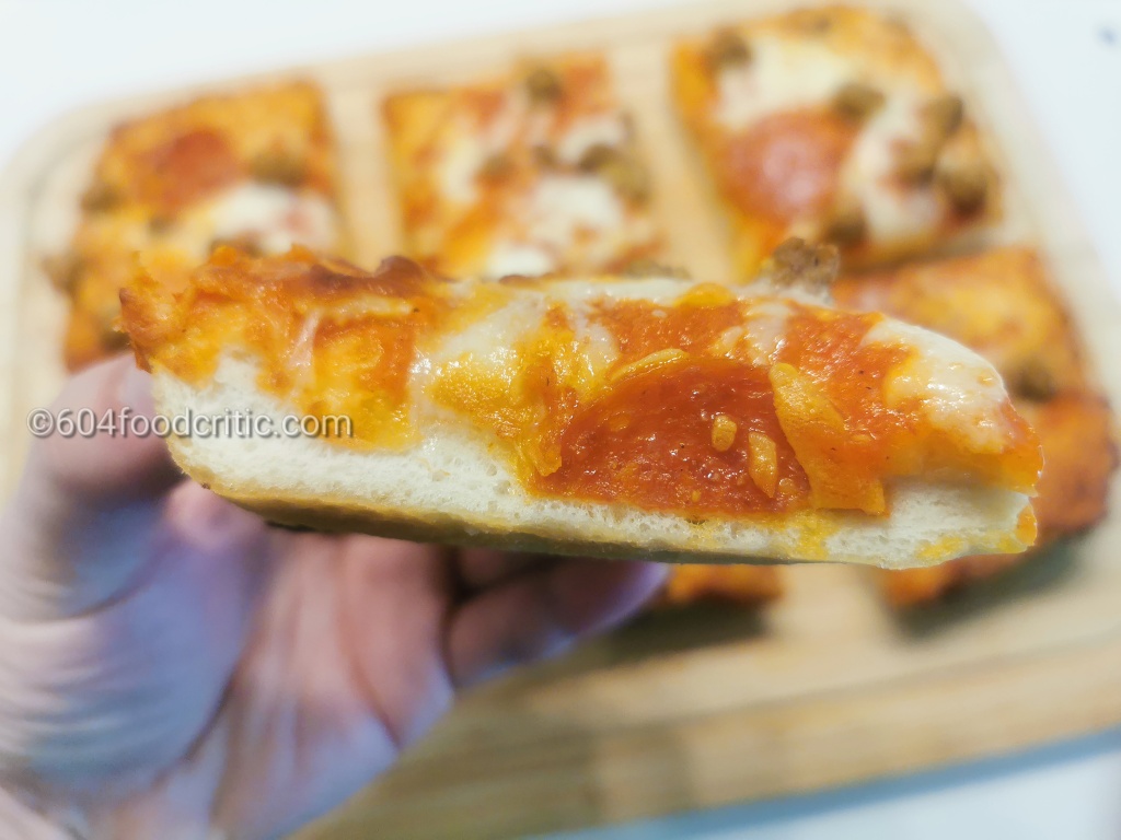 Delissio Crispy Pan Pizza cut