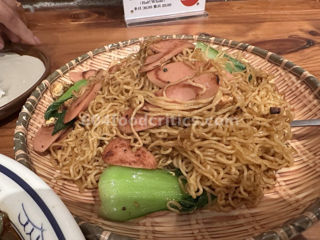 Stir-fried instant noodles with ham sausage and bok choy at Cheng Du Street Food