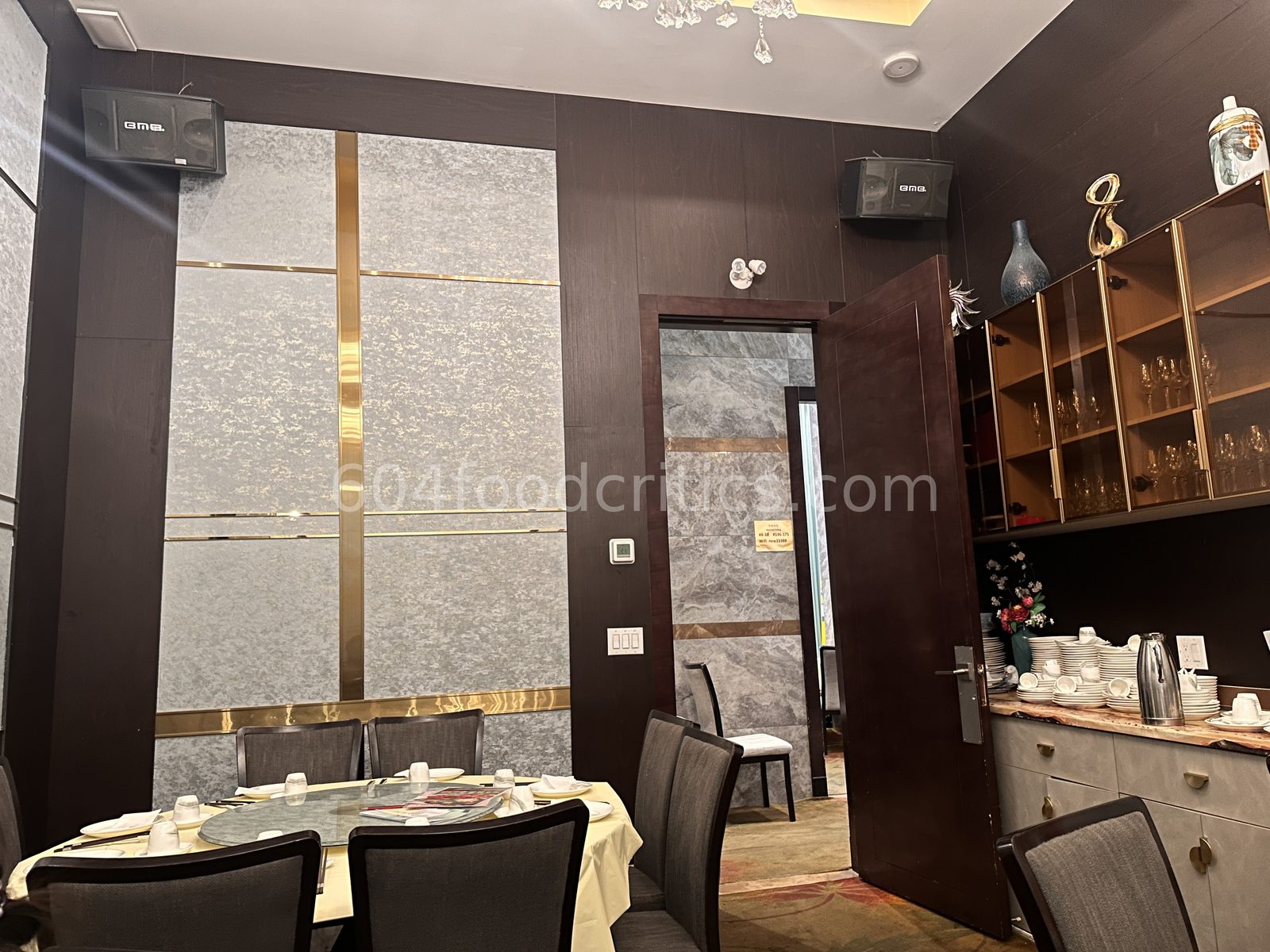 Door into a small dining room at New Mandarin Seafood Restaurant