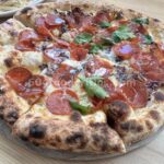 Bufala River District (2026): Wood-Fired Pizza, Infused Olive Oils and a Bright, Easy Room