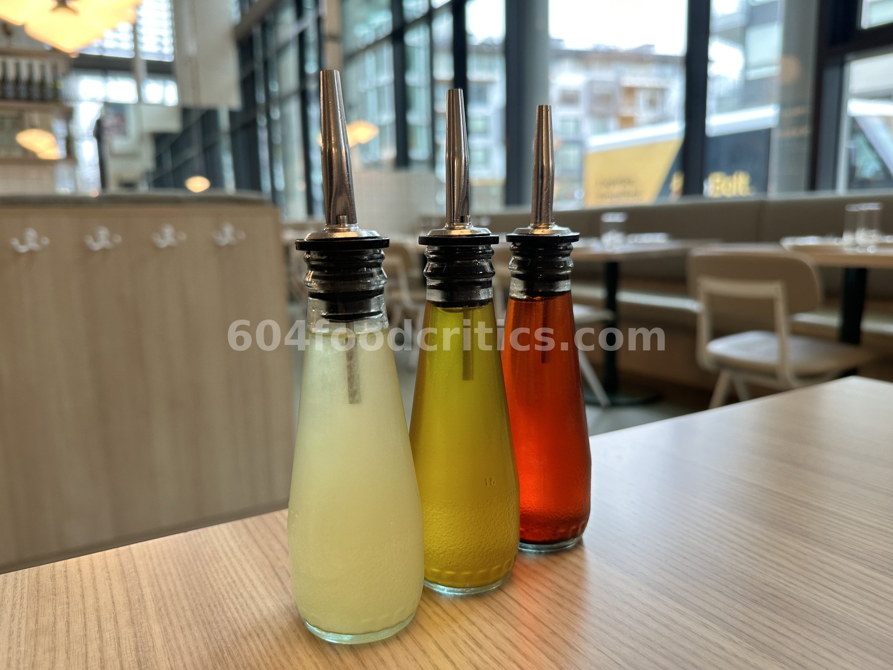 Three infused olive oils on every table
