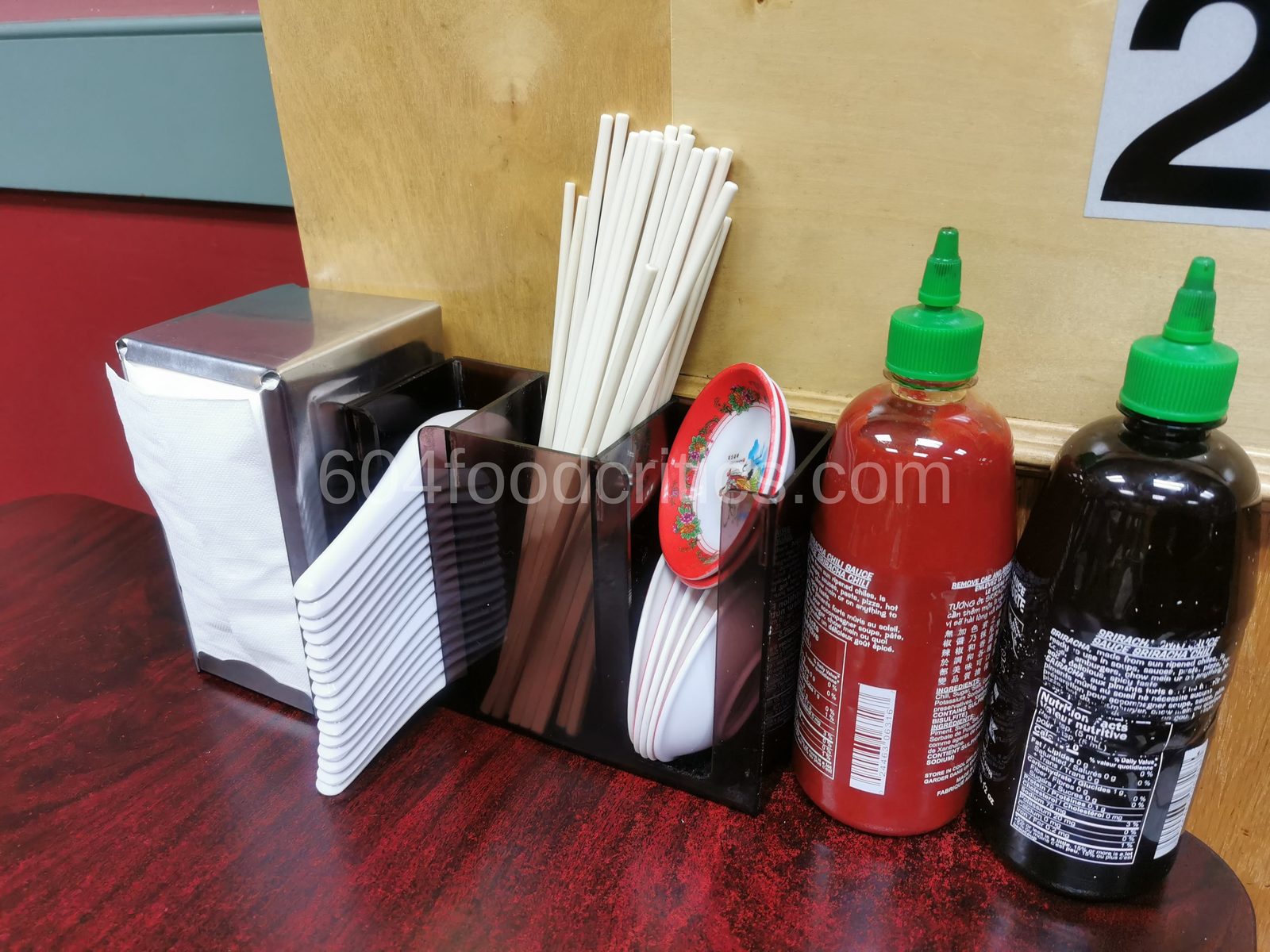 Sauces on the table at Cafe Xu Hue