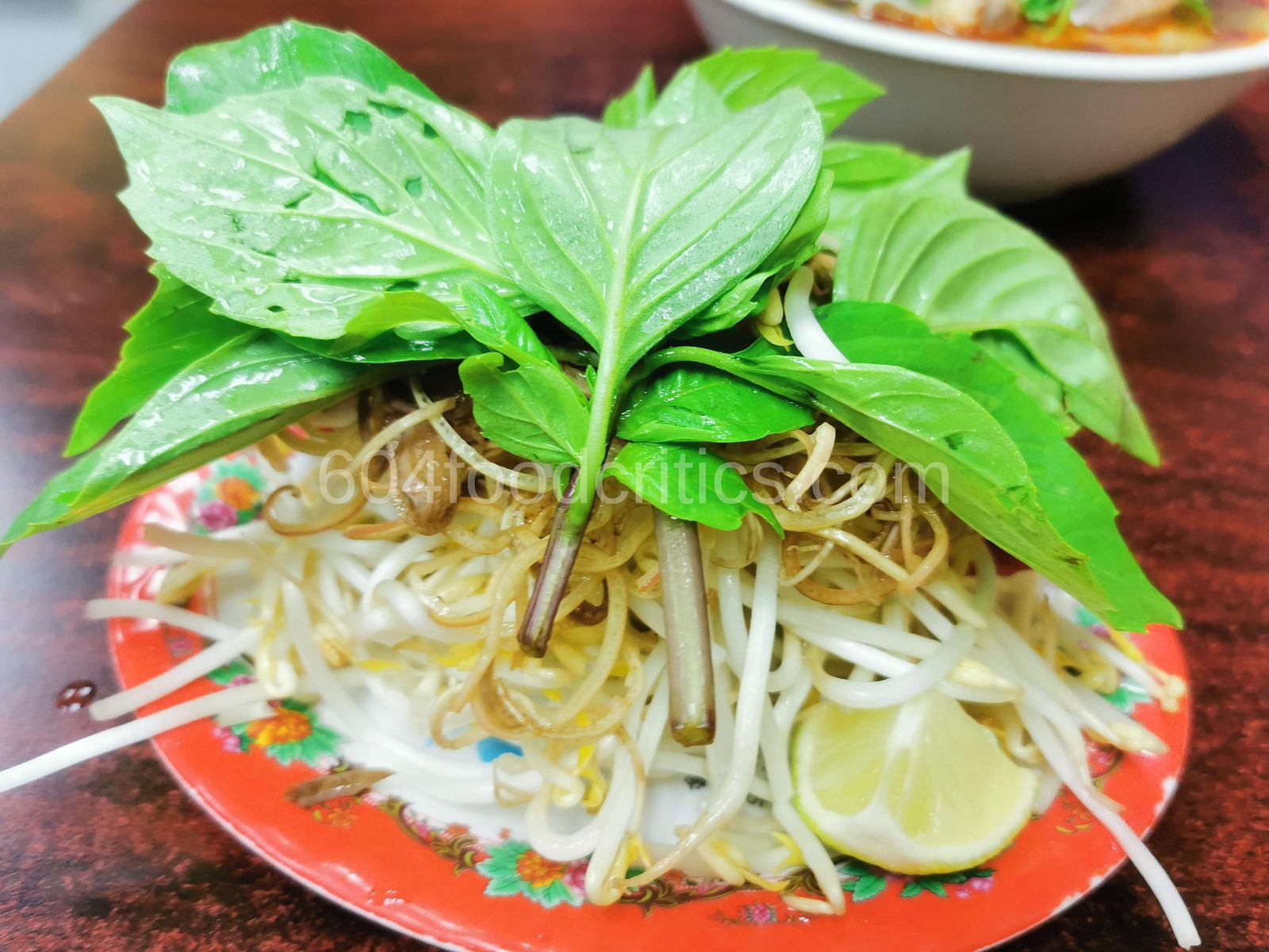 Bean sprouts, shredded banana leaf, and lime