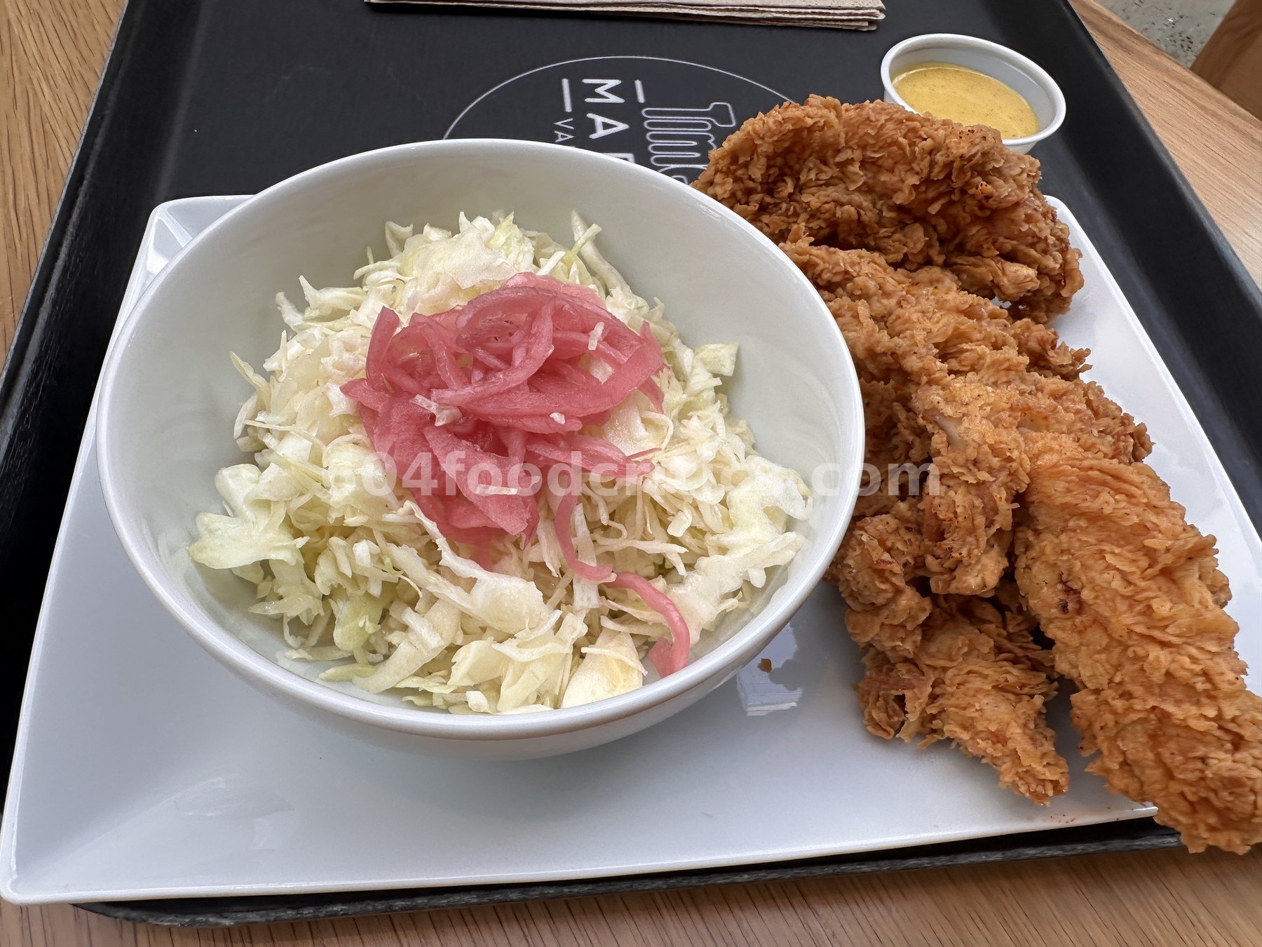 DownLow 5-piece tenders with slaw, pickled red onion and dipping sauce at Time Out Market Oakridge