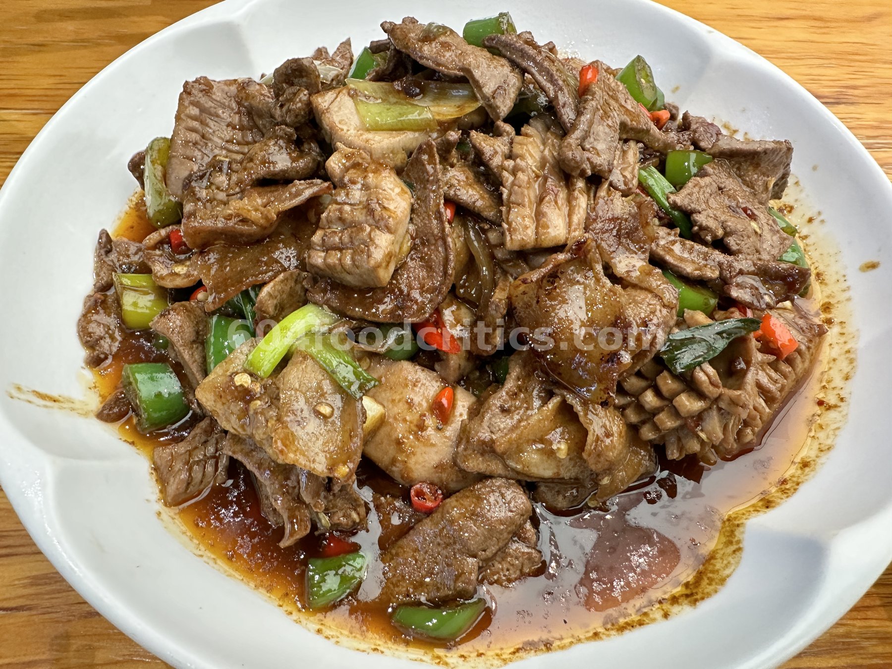 Stir-fried beef and tripe with green and red chilies at Myth Szechuan