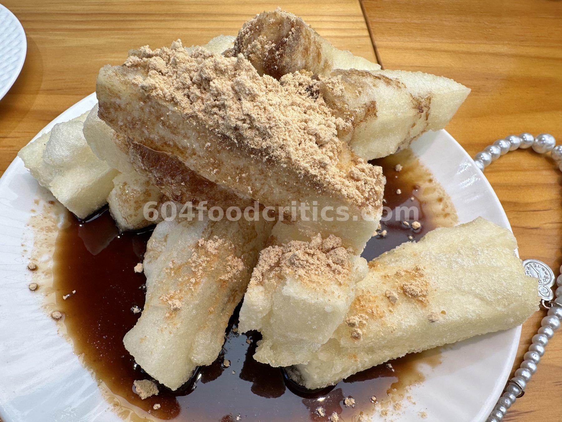 Fried rice cakes with brown sugar syrup and soybean powder at Myth Szechuan
